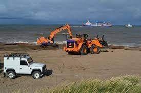 How are vegetation management and beach nourishment similar in the ways they combat beach erosion?
