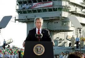 In this 2003 photograph, president bush tells the public that the major combat efforts in iraq are o