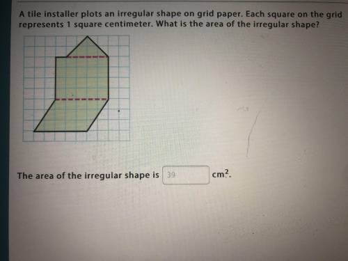 A tile installer plots an irregular shape on grid paper. Each square on the grid represents 1 square