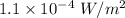 1.1 \times 10^{-4} \ W/m^2