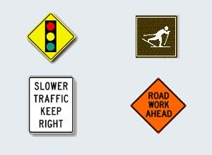 Which of these signs is a warning sign?  a. the brown sign b. the white sign