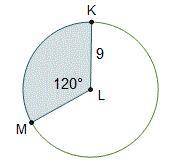 Circle L is shown. Line segments K L and M L are radii. The length of K L is 9. Angle M L K is 120 d