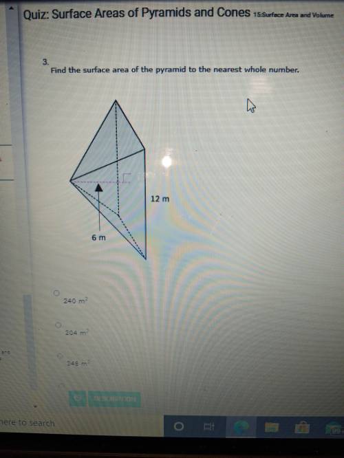 Find the surface area of the pyramid to the nearest whole number.