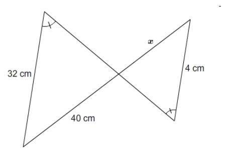 What is the value of x? Enter your answer in the box. x = cm A bow tie shape polygon made of two bo
