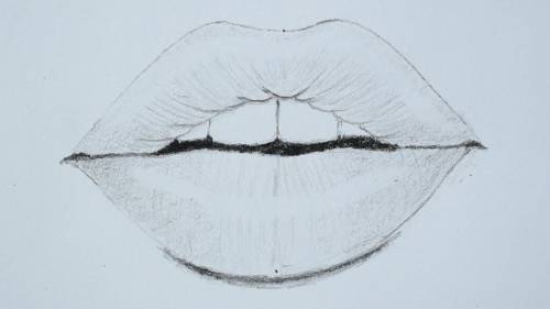 Here are some more of my drawings! The one with the lips isn't done yet!