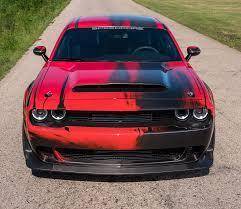 Which car is nicer dodge demon or mustang
