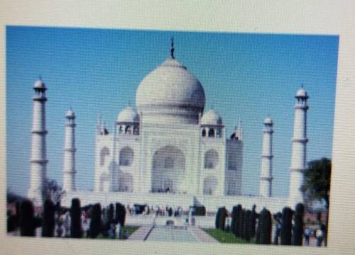 Look at this image of the Taj Mahal in Agra, India. The design of this building was influenced by t