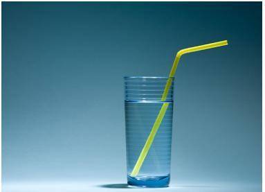 Study the image below.

A straw in a glass of water. The straw appear to be broken and shifted at