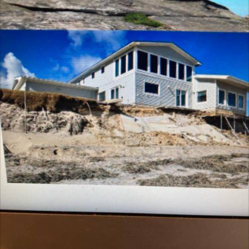 In the photo of the house; What is happening to the foundation of
the house?