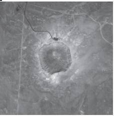 A large meteorite crater that is 1200m in diameter and 170m deep is located in a flat, arid (dry) p